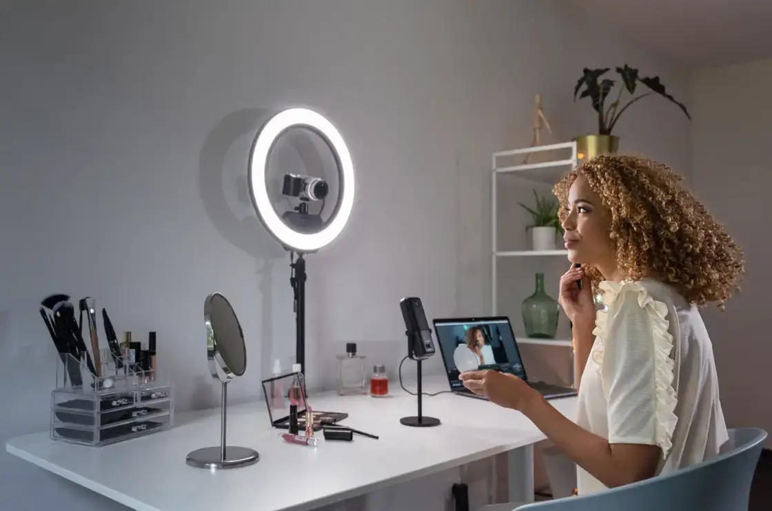 The same person filmed with a CreatorKit Aura Ring Light, looking professional and clear.