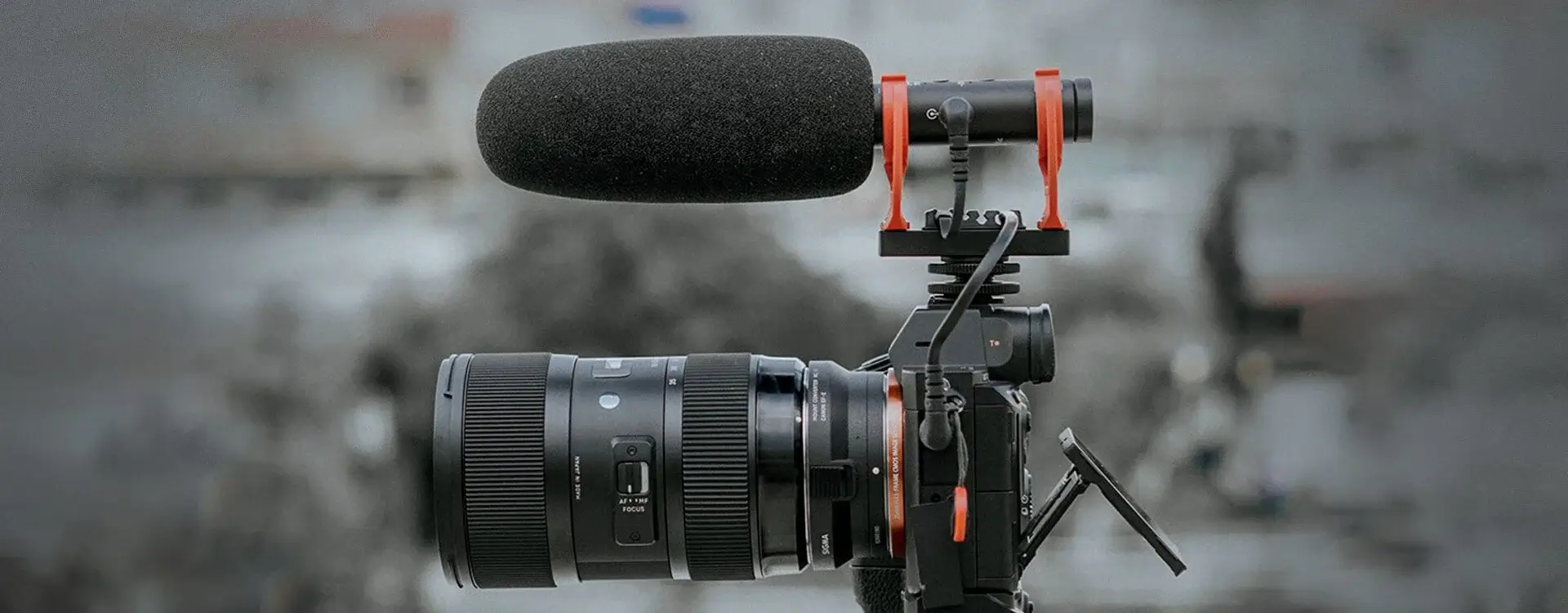 A CreatorKit shotgun microphone mounted on a camera.