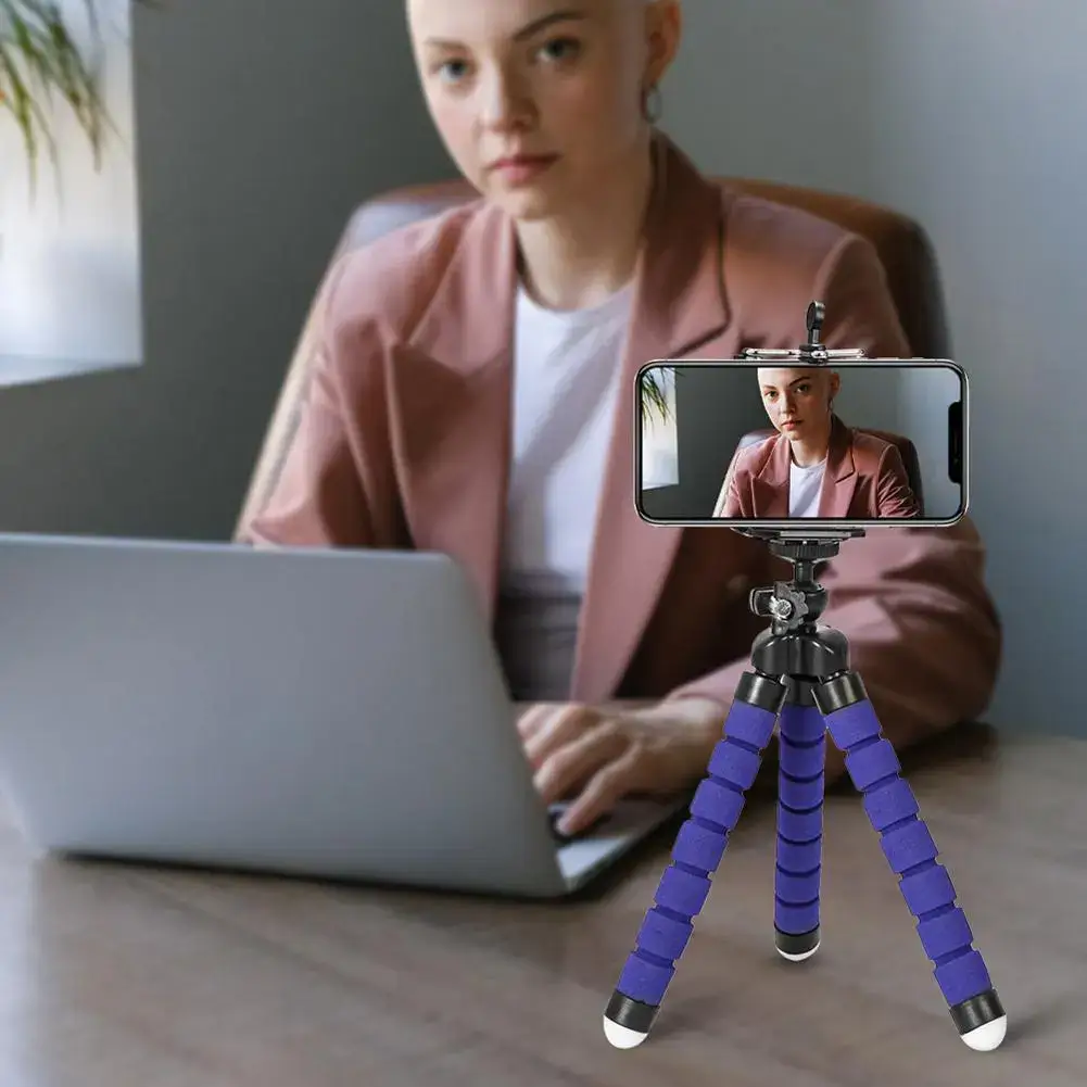 A sturdy and flexible tripod holding a camera