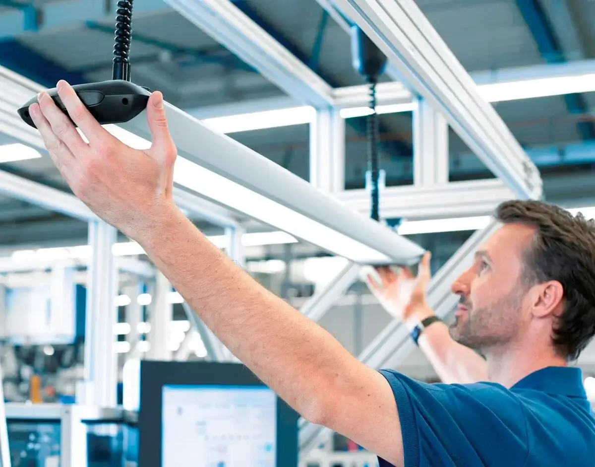 A technician inspecting the circuitry of an LED panel